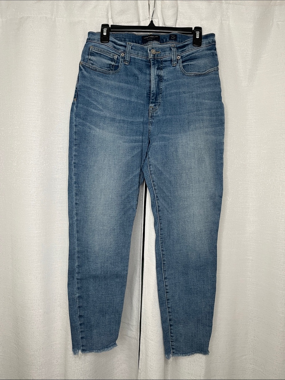 Lucky Brand denim Ankke Straight Jeans with Distressed Hem. Size 10